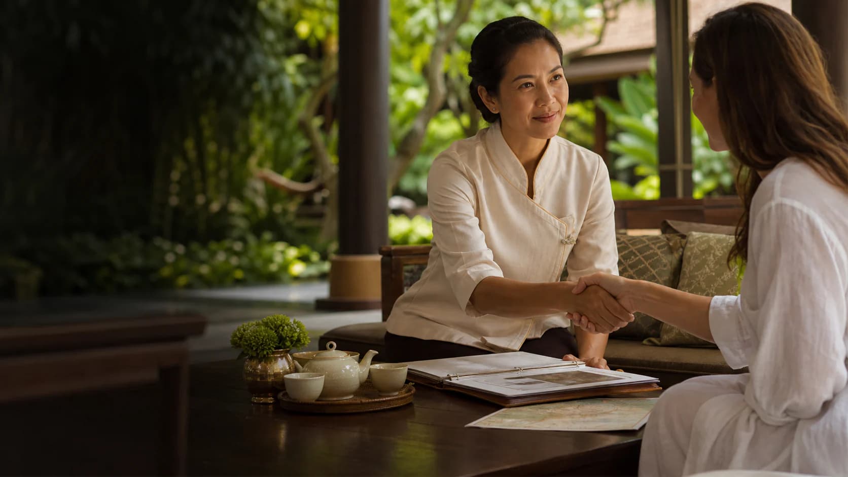 A Thai hospitality professional and travel designer connecting over a thoughtfully prepared itinerary